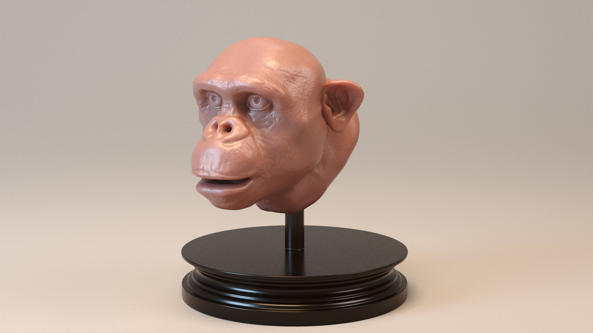 A bust of a chimp modelled and on top of a stand.